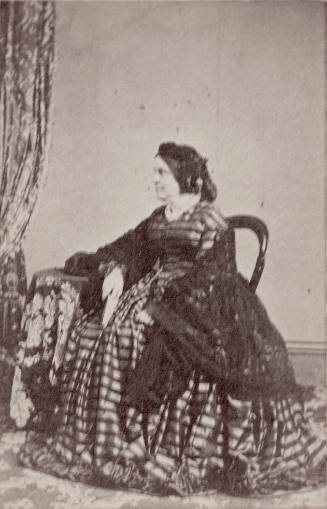 Unknown seated woman
