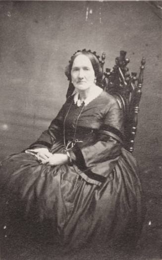 Unknown seated woman