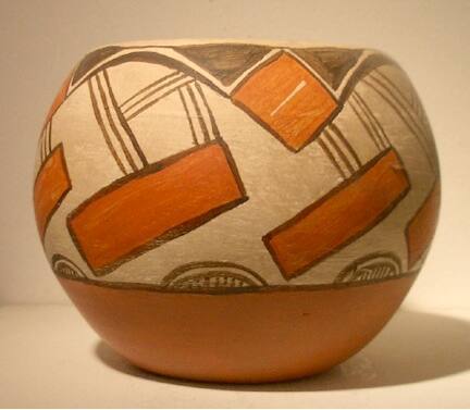 Orange and brown on white pot