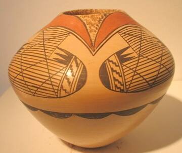Pot with brown and orange designs on buff