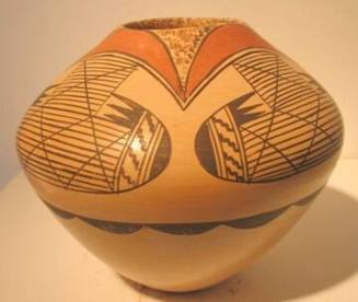 Pot with brown and orange designs on buff