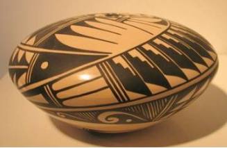 Seed pot with brown-on-buff designs