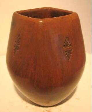 Pitch coated pot