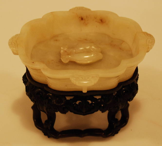 Wooden stand for greenish white jade dish with two fish inside