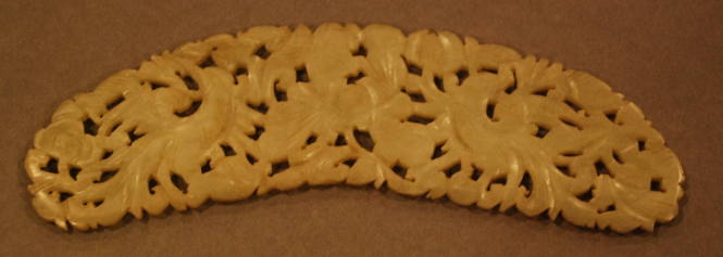 Jade open work appliqué curved ovoid form, depicting two Feng Hung birds on a peony background
