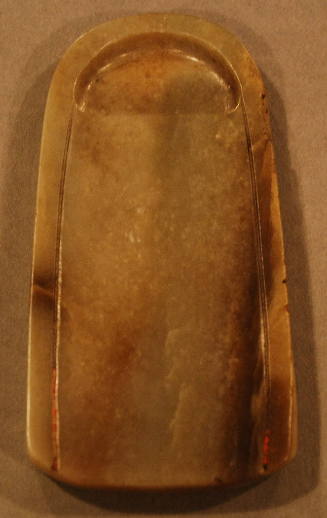 Jade ovoid form ink tablet having smooth surface with two grooved lines and an inkwell