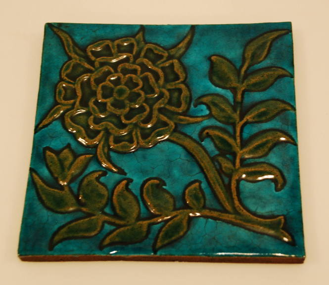Turquoise with olive green flower ceramic tile