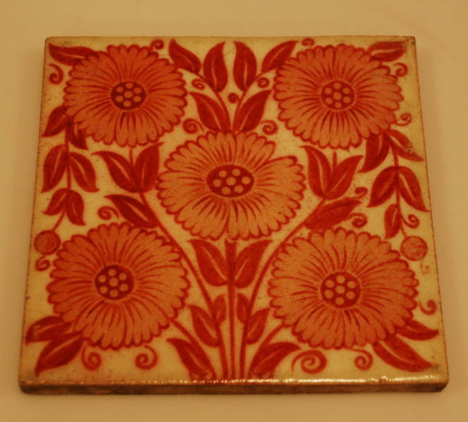 White with red floral design ceramic tile