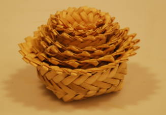 One of seven single weave nested baskets ranging in size form 1 1/2” x 4” to 1” x 1 1/2”