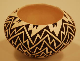 Black-on-white jar with lightning design