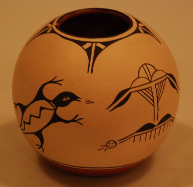 Pot with animal and rain cloud designs