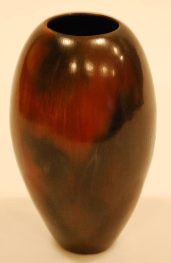 Pitch coated vase