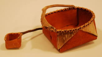 Traditional water basket with ladle