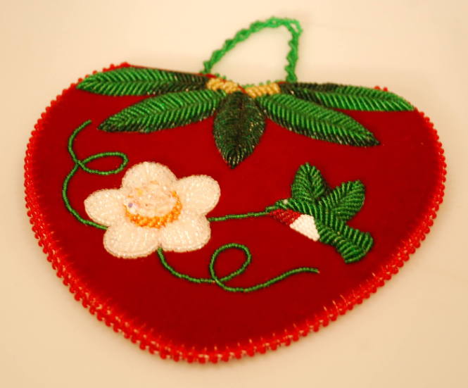 Strawberry shaped needle case with leaves, flower and hummingbird design