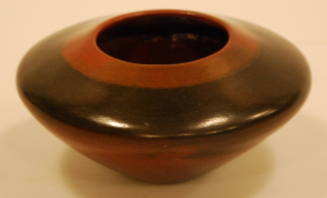 Pitch Coated Pot with Brown Circle Around Rim