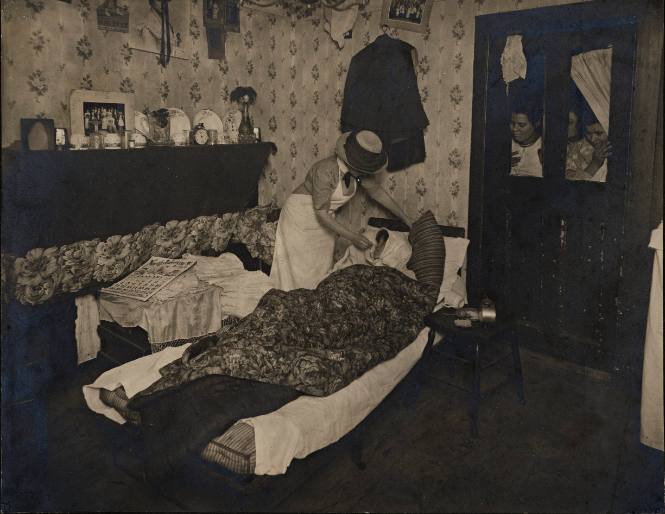 Nurse Attending to III Women at Home