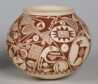 Brown on white Mimbres design pot with goat, snake and bee