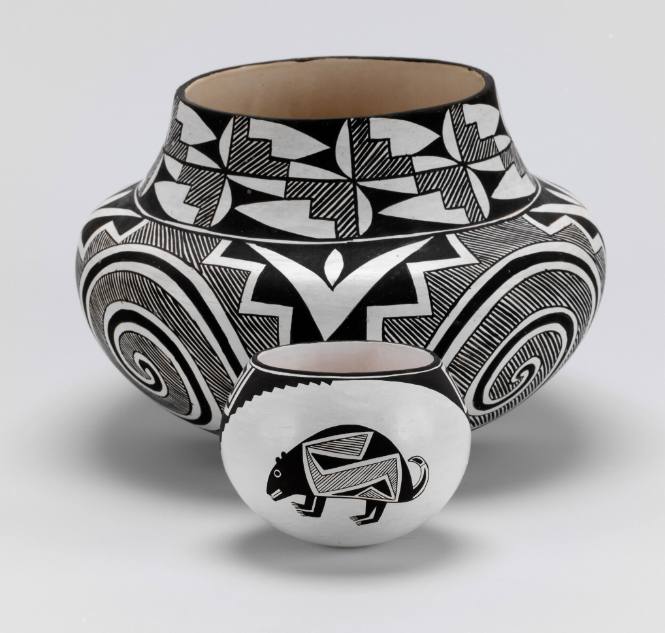 Black-on-white pot with two Mimbres style bears