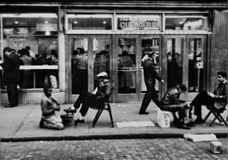 NYC Diner with shoeshine boys working in front