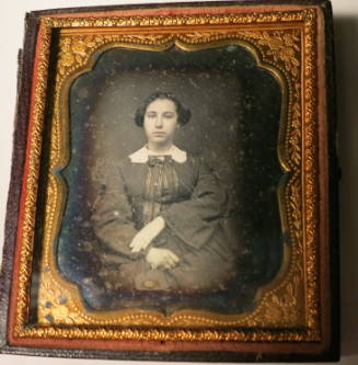 Elegant Woman with Crossed Hands