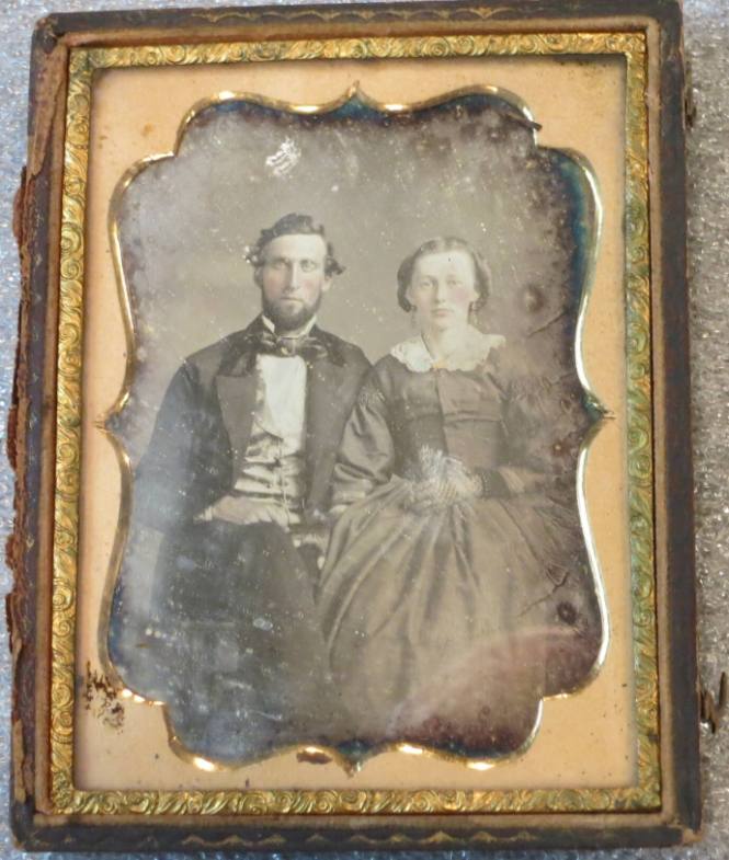 Seated Fancy-dressed Couple
