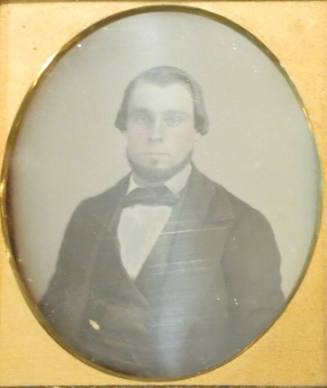 Close-up of Man in Suit and Bowtie