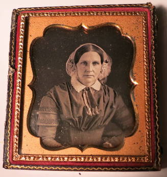 Close-up of Woman in Lace Bonnet
