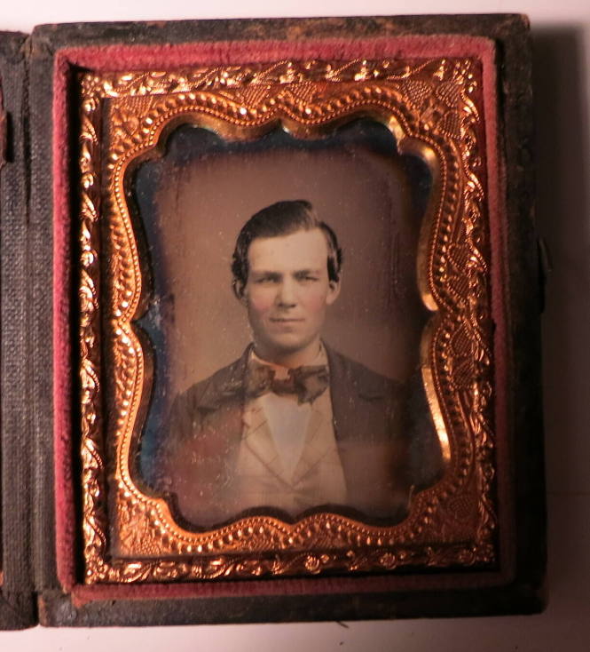 Close-up of Man in Bowtie and Plaid Vest