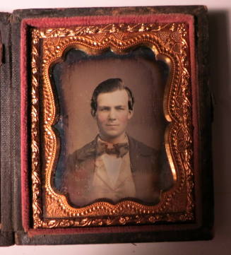 Close-up of Man in Bowtie and Plaid Vest