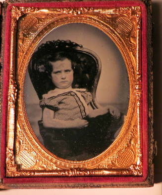 Seated Boy with Skin Lesions