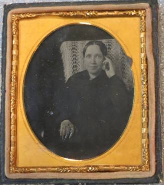 Seated Woman with Finger to Temple