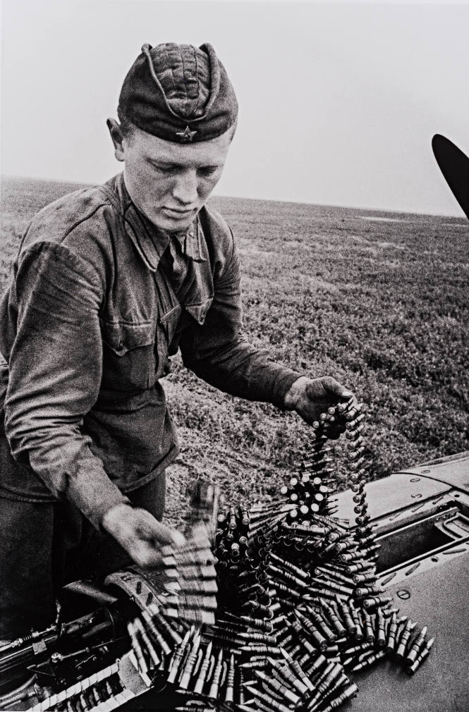Gunner Loading Ammunition