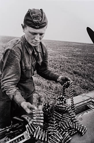 Gunner Loading Ammunition
