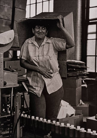 Worker Series (female worker with box on head, smirking)