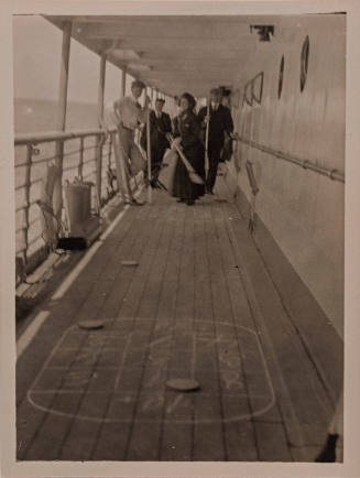 Two Couples on Ship-Deck Playing Shuffleboard