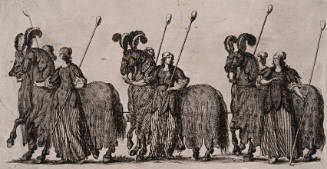 Women standing with costumed horses