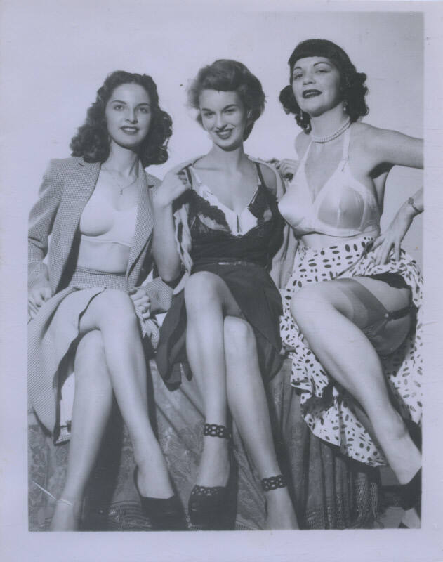 Untitled [Three women sit cross-legged]