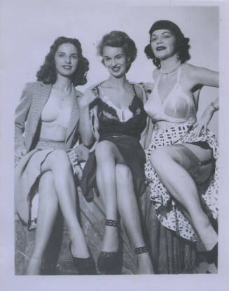 Untitled [Three women sit cross-legged]
