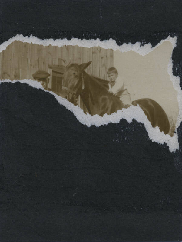 Untitled [Man stands by horse, child rides horse]