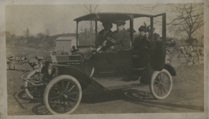 Untitled [Two women and two men sit in car]