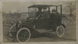 Untitled [Two women and two men sit in car]