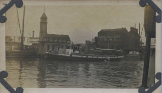 Untitled [Image of body of water, boats, and buildings, one of them reads CORDING & SALZMANN COAL]