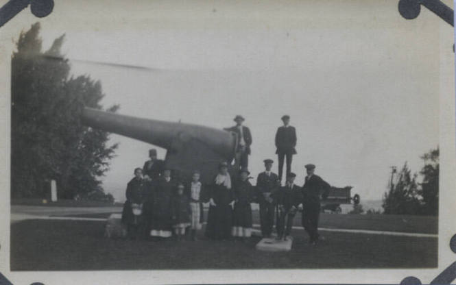 Untitled [Crowd stands by cannon]