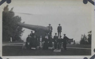 Untitled [Crowd stands by cannon]