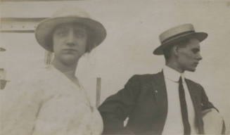 Untitled [Woman and man, man looks away]