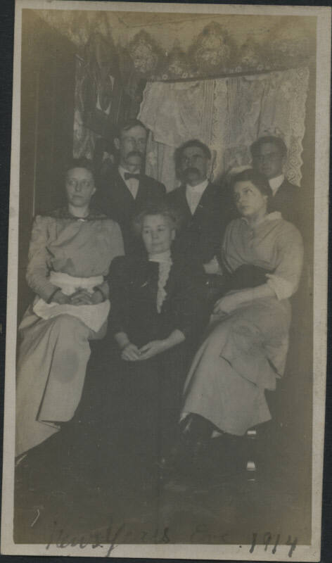 Untitled [Three women sit, three men stand]