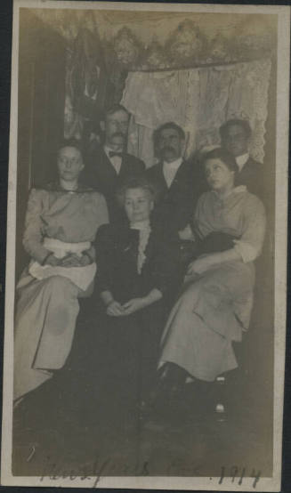 Untitled [Three women sit, three men stand]