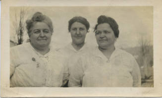 Untitled [Three women stand outside]