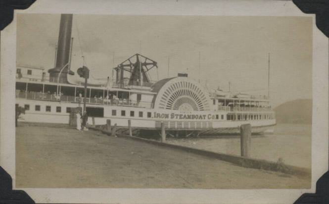 Untitled [Ship on water that reads Iron Steamboat Co.]