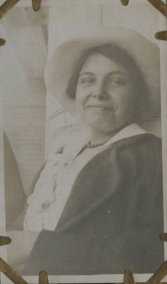 Untitled [Woman wears hat (#214 duplicate)]